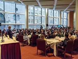 Guests listen to the NYC Market Overview Presentation