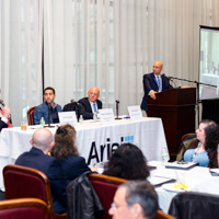 Panelists engage in a discussion moderated by Shimon Shkury at Coffee & Cap Rates, February 4, 2016