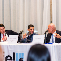 Panelists engage in a discussion moderated by Shimon Shkury at Coffee & Cap Rates, February 4, 2016