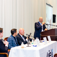 Panelists engage in a discussion moderated by Shimon Shkury at Coffee & Cap Rates, February 4, 2016