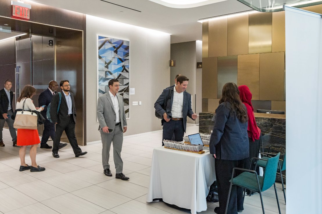 Attendees arriving at Coffee & Cap Rates, July 2026