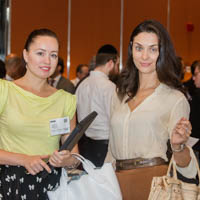 (L-R) Yuliya Bohush, R.E.M.Residential; Lara Lapysh, R.E.M.Residential